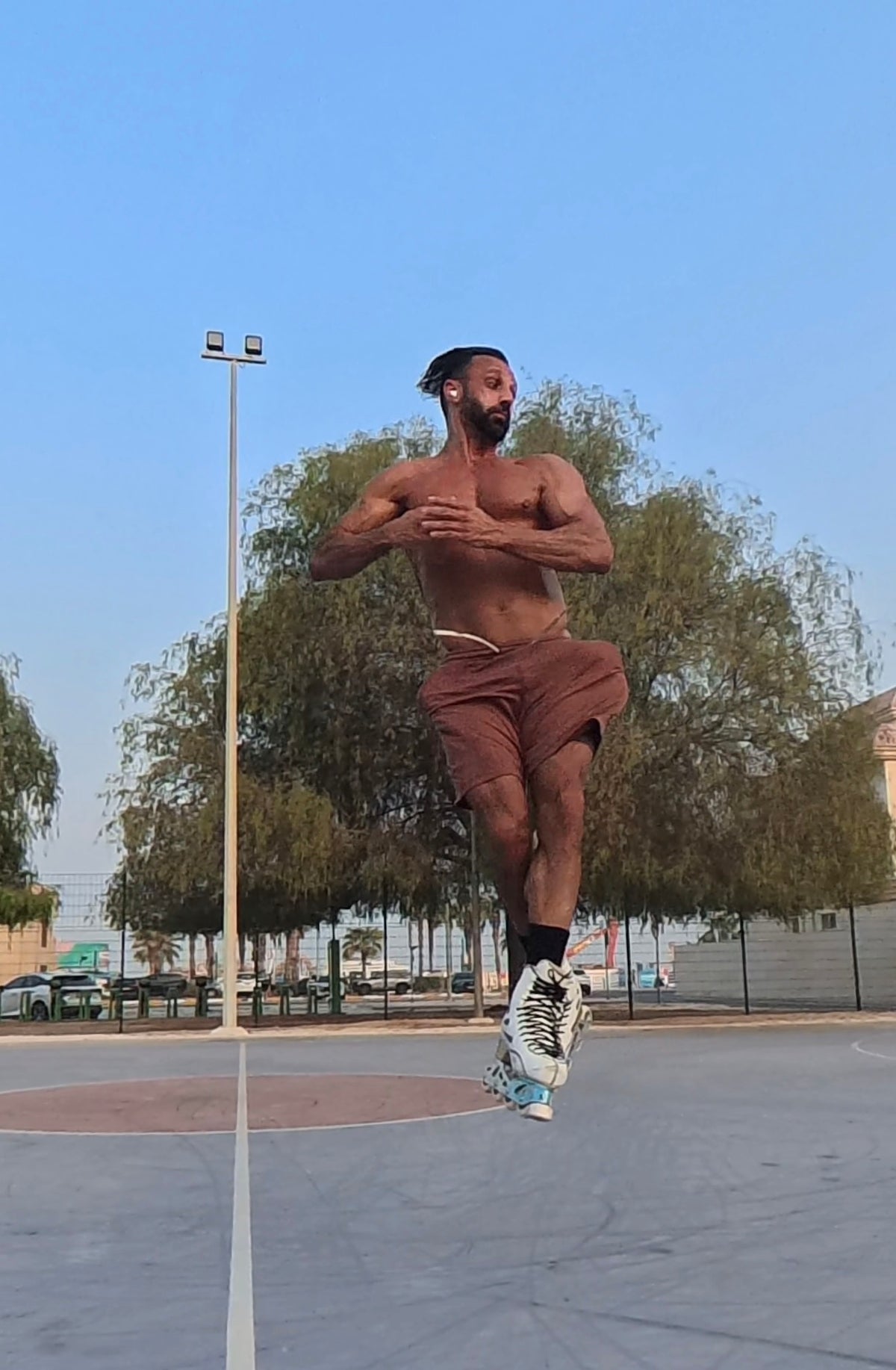 Adam Jukes demonstrating an inline skating jump.
