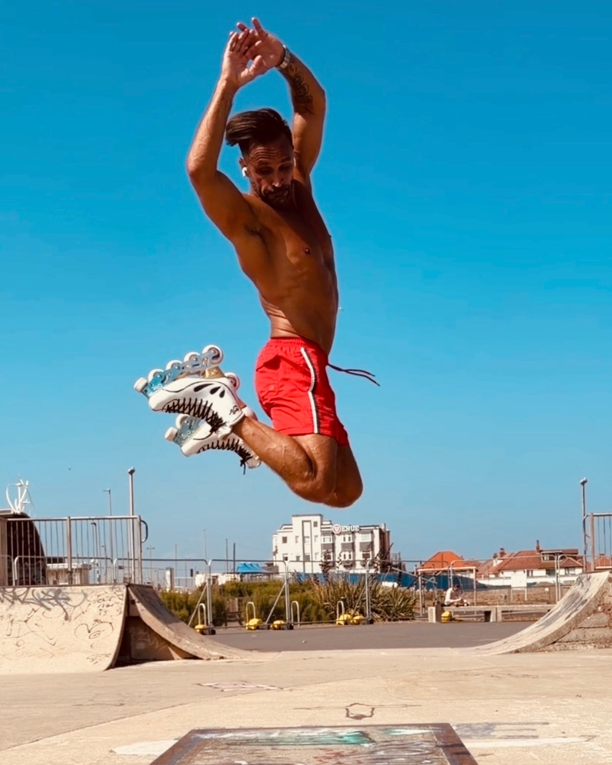 Adam Jukes jumping wearing the Blue and Silver  EDGE Founder Edition system.