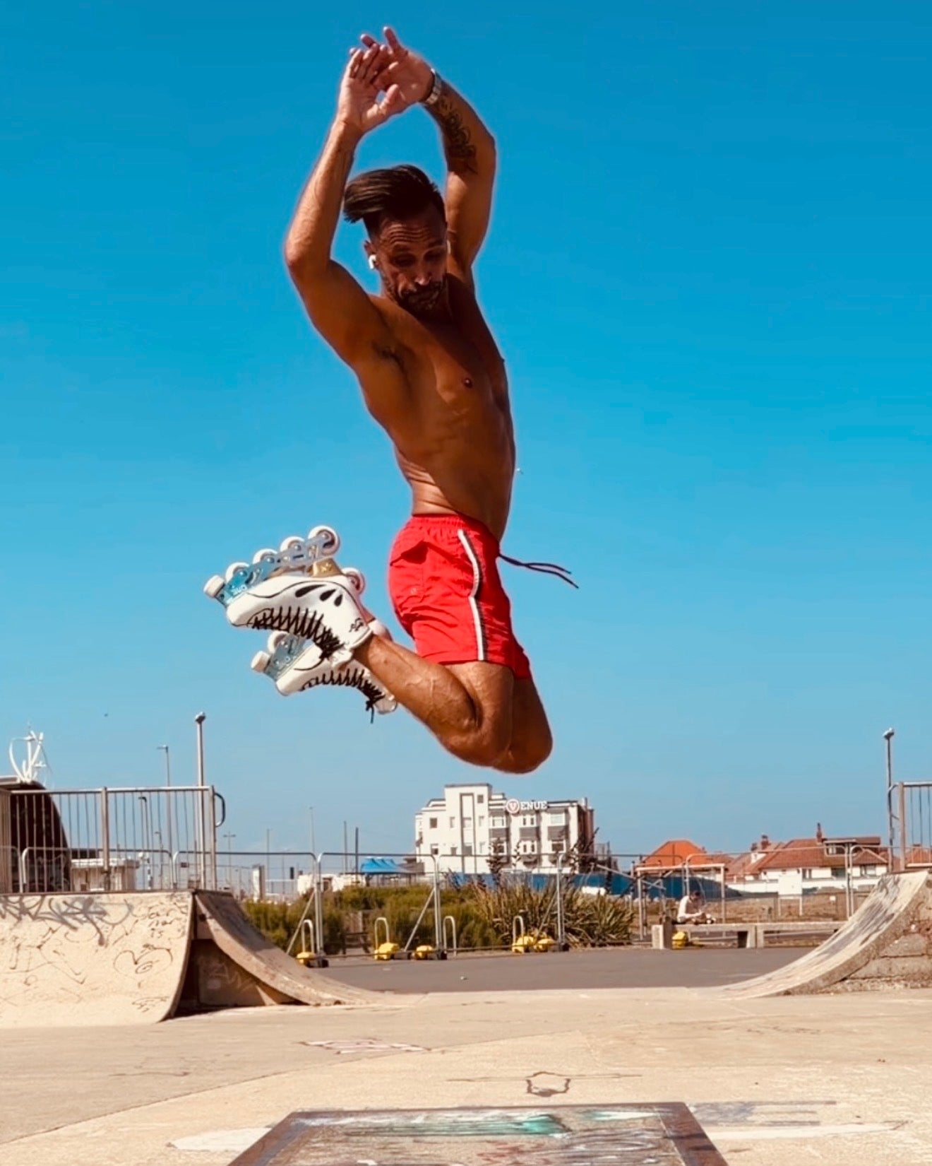 Adam Jukes jumping wearing the Blue and Silver  EDGE Founder Limited Edition system.