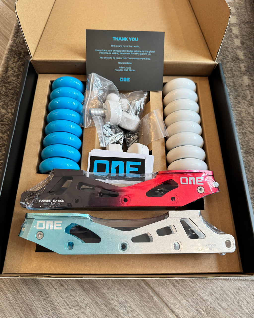 A boxed set of ONE Blades Founder Edition inline figure skating frames and all accessories.