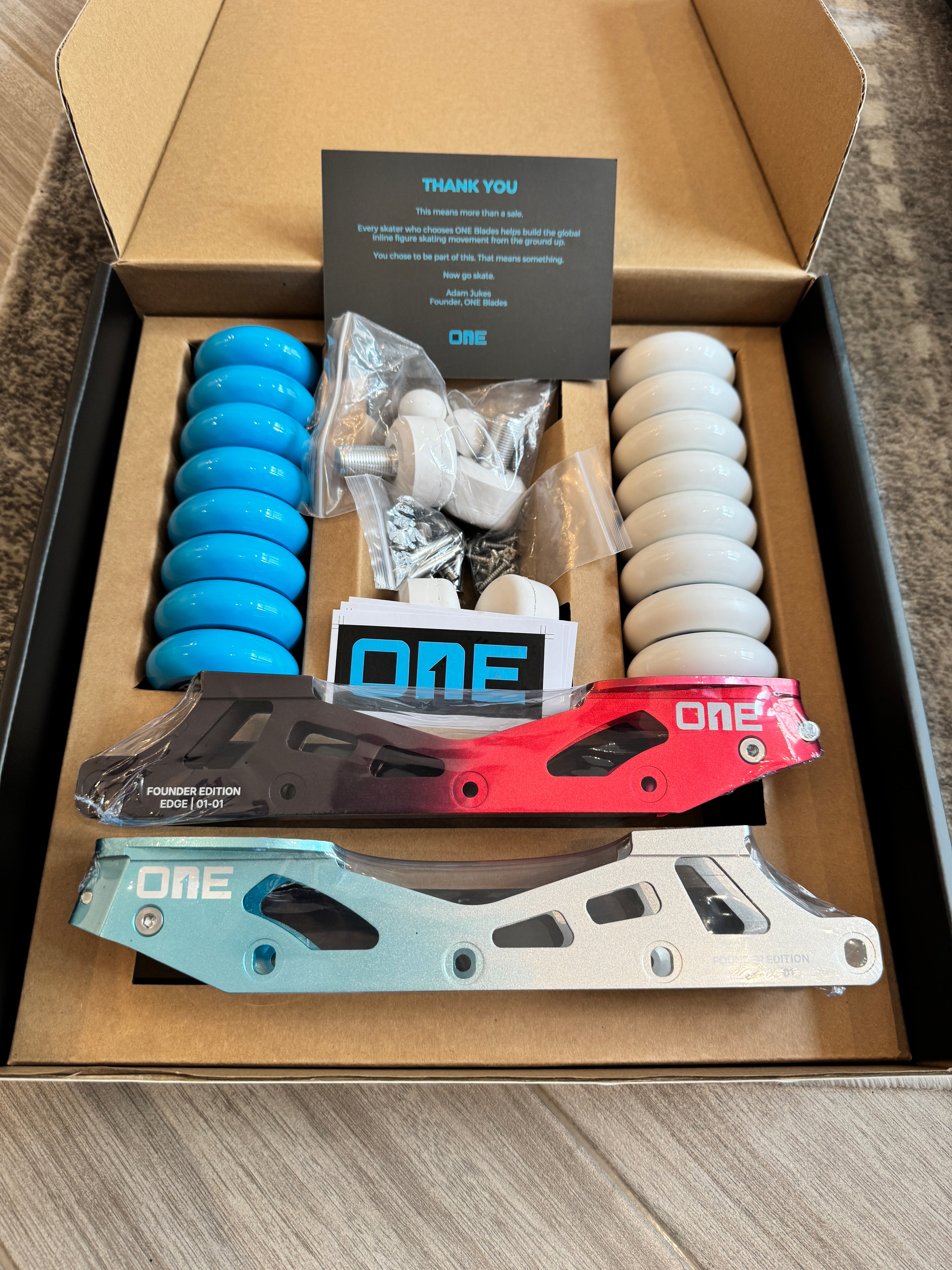 A boxed set of ONE Blades Founder Edition inline figure skating frames and all accessories.