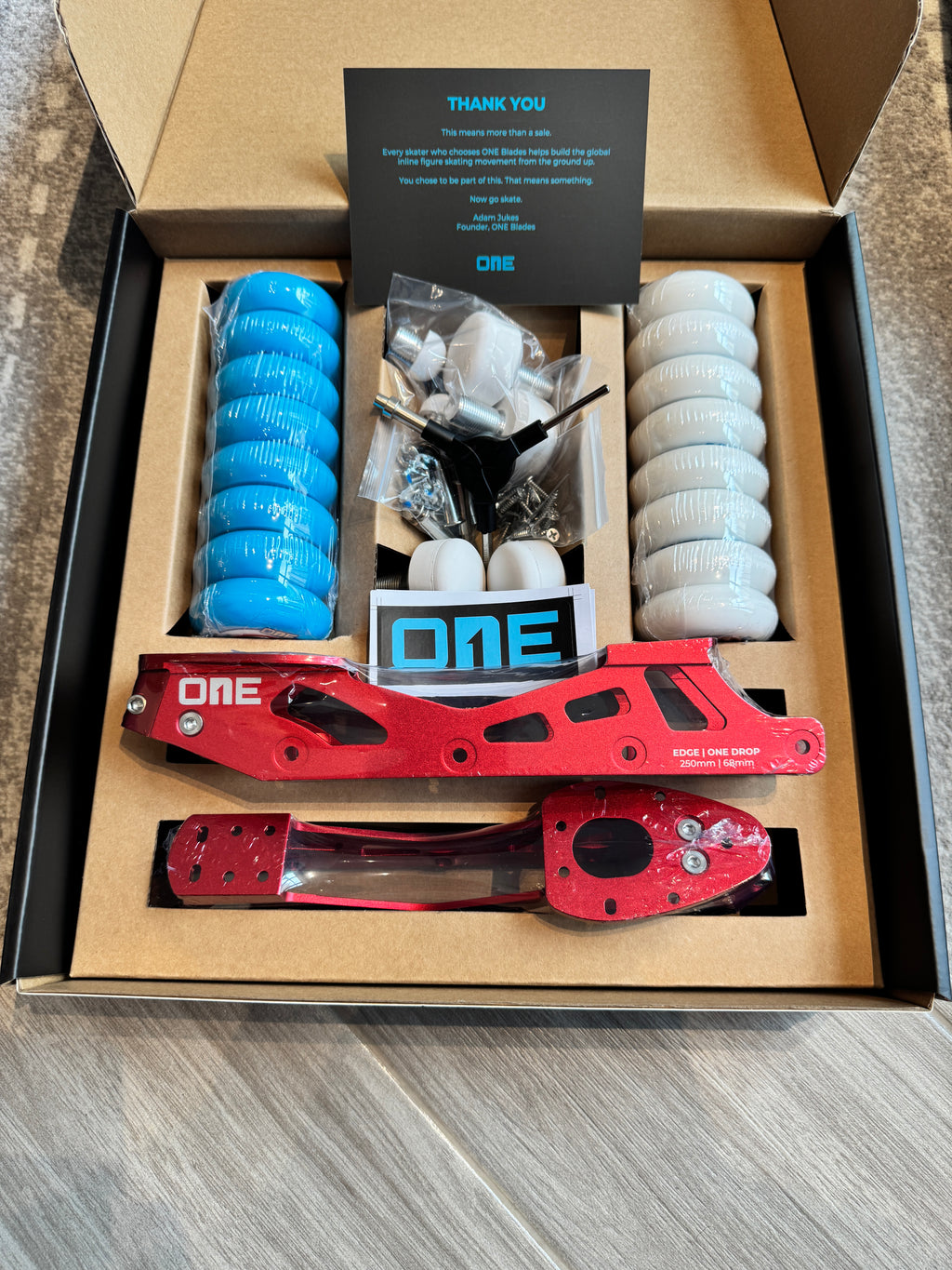 ONE Blades EDGE unboxing, complete inline figure skating system with frames, wheels, picks and hardware in the presentation box
