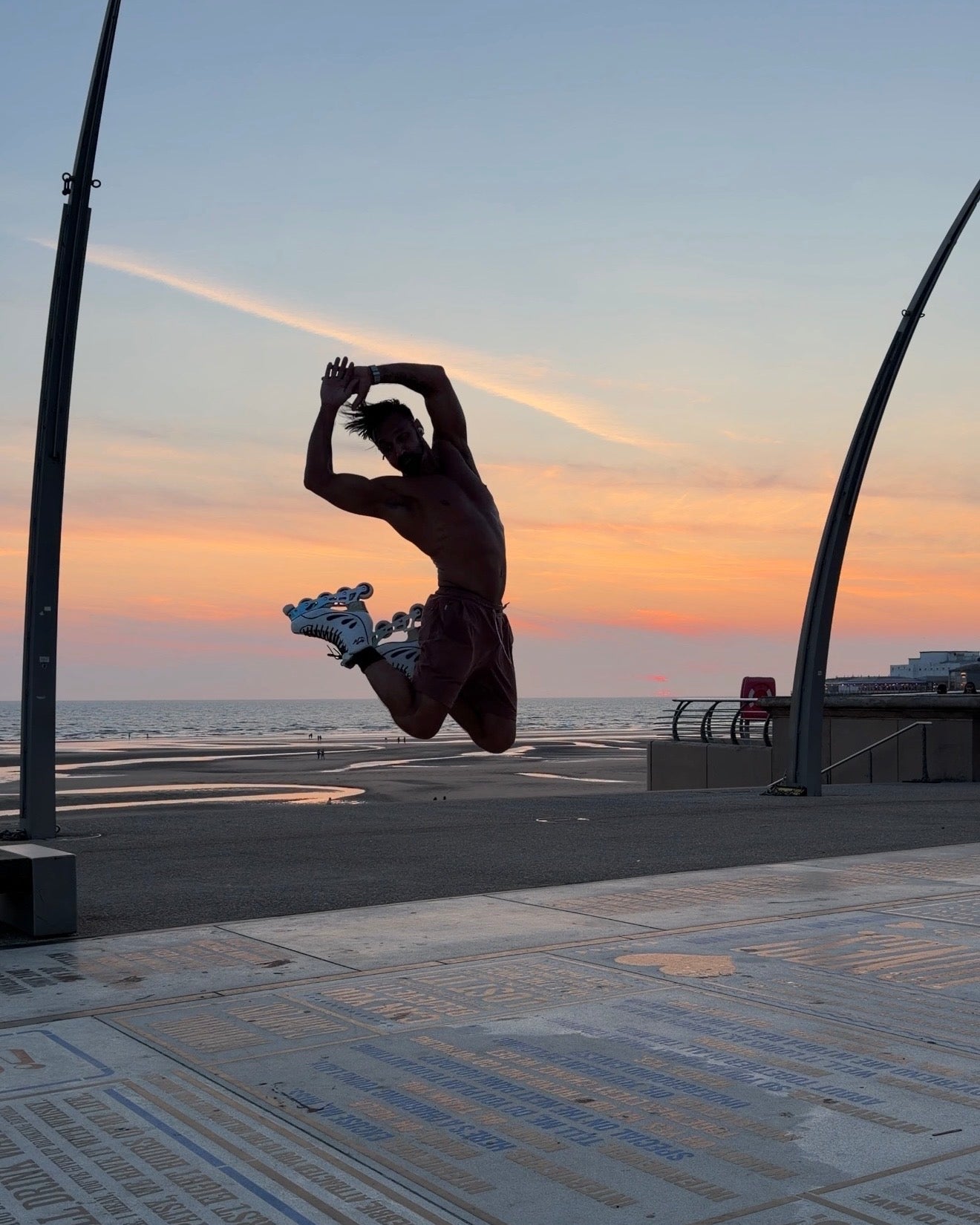 Adam Jukes skating, jumping, spinning and performing inline figure skating moves wearing the EDGE Founder Edition on the comedy carpet in Blackpool.